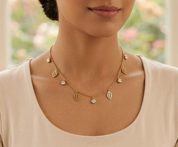 Dainty Gold Charm Necklace – Clover, Butterfly & Leaf