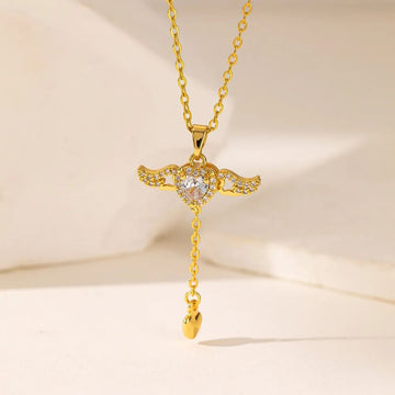 Gold Angel Wing Necklace | CZ Heart Pendant with Wings